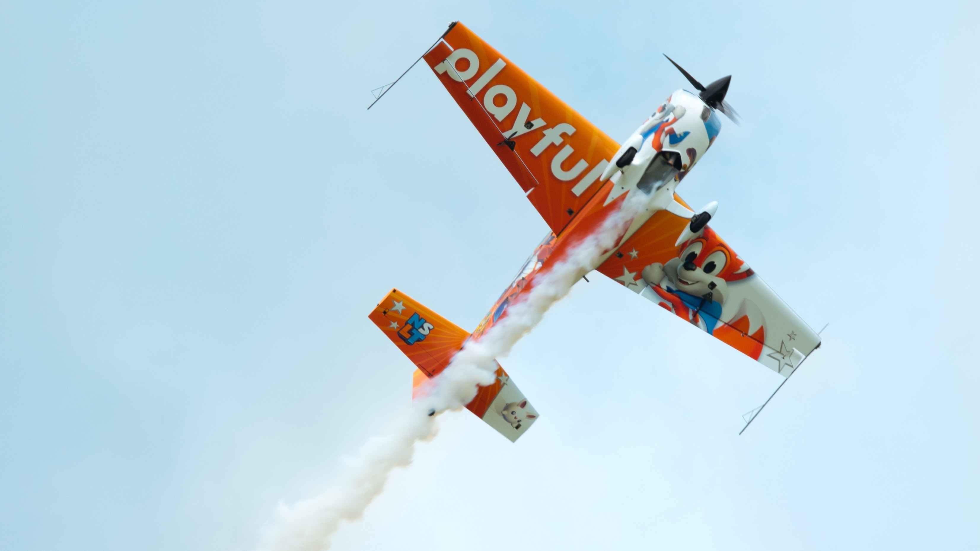 Adam Baker Extra 330 in flight